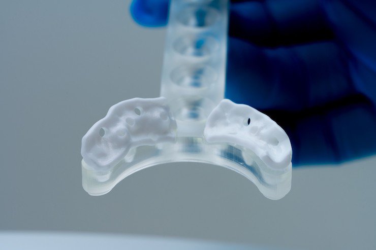 two-zirconia-subperiostal-implants-on-surgical-applicator.jpg